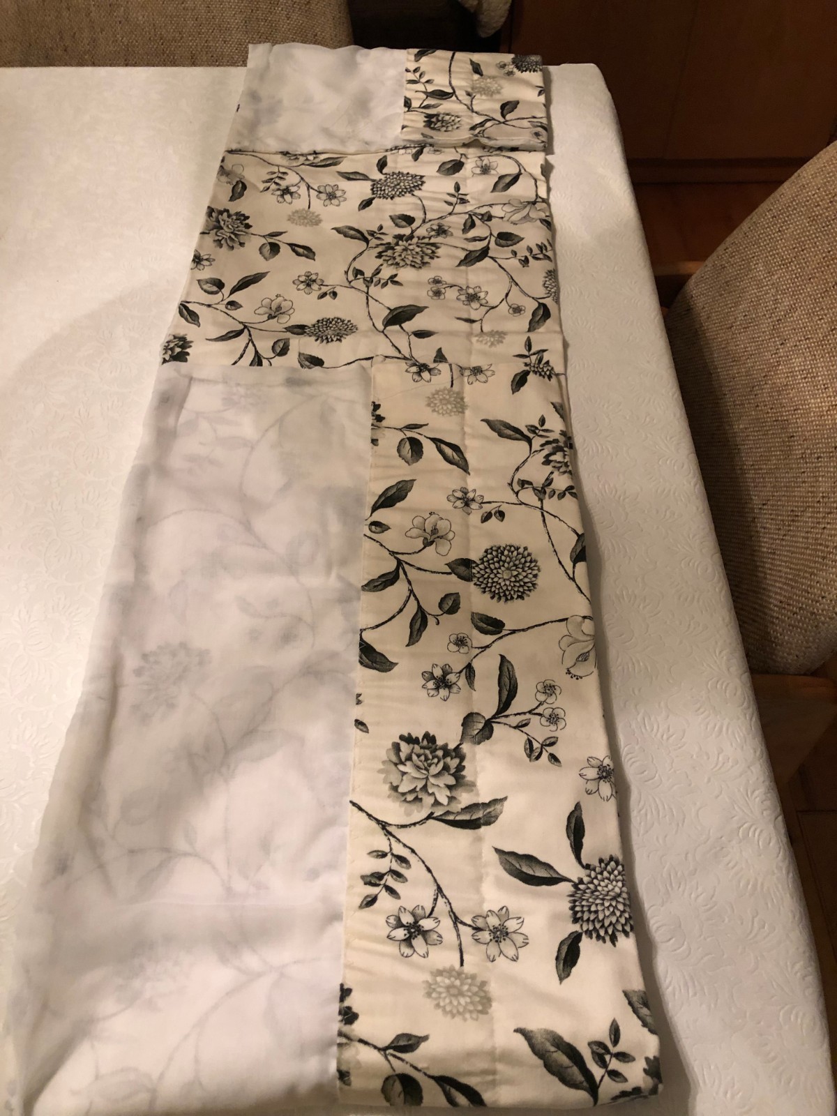 Valance in beige, white, and black